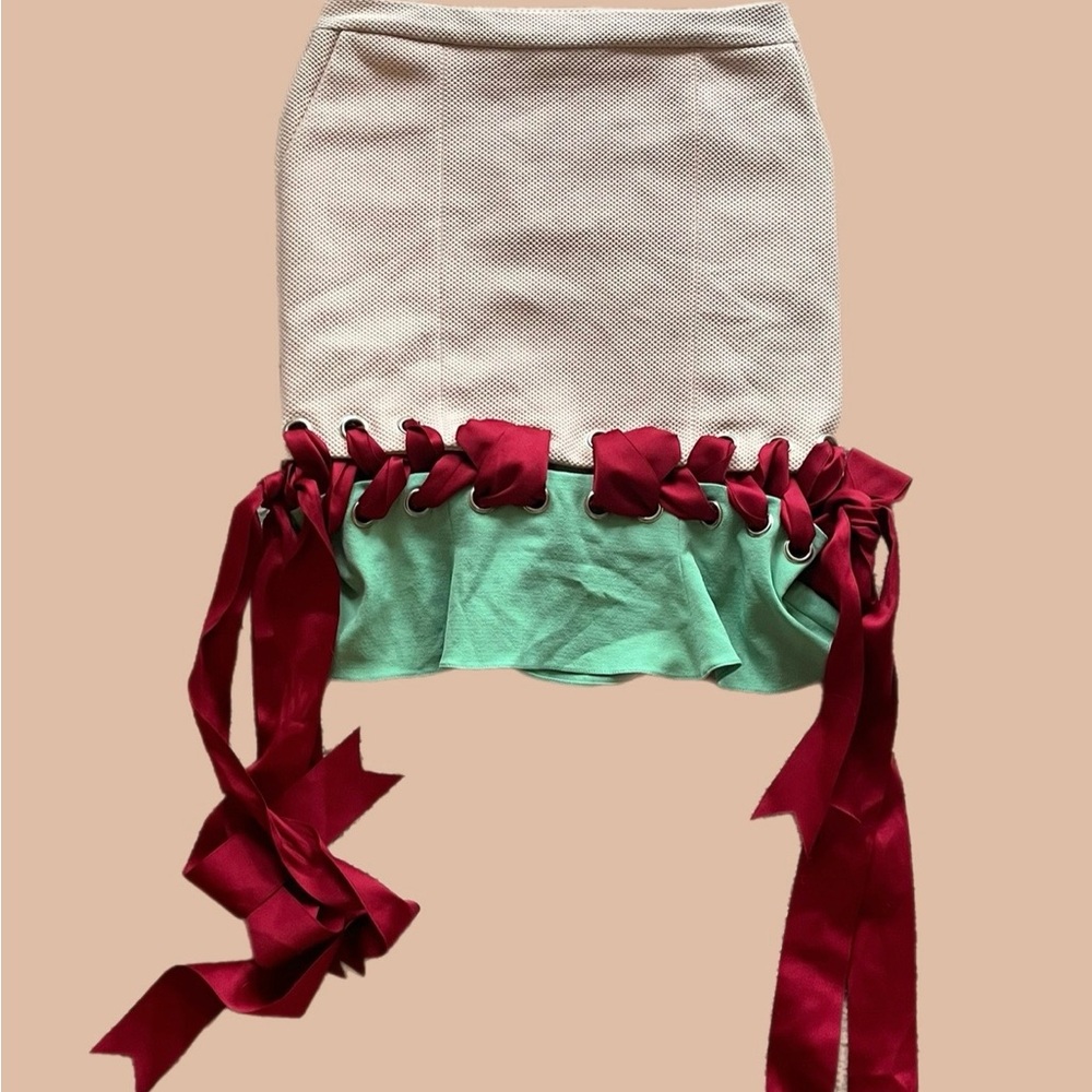 Elegant Cream and Green Skirt with Red Accents